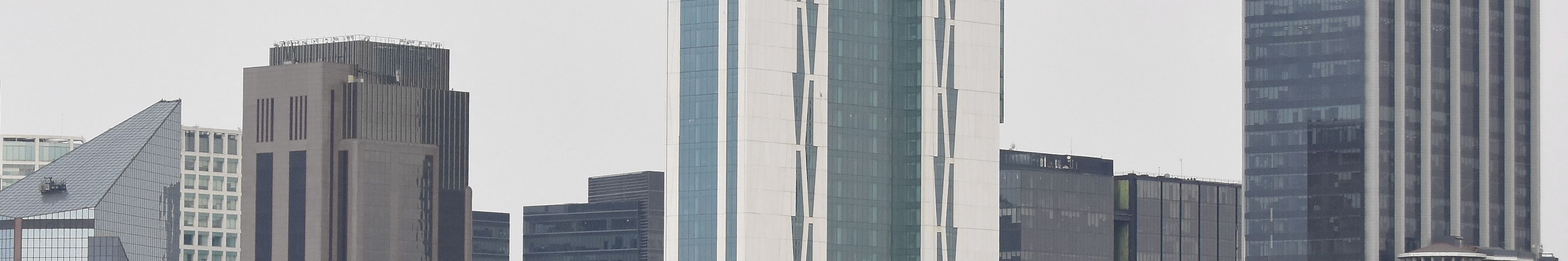 Scene at sunset with buildings in the foreground