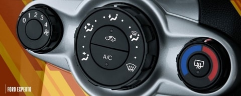 Botón de A/C en un automóvil