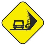 Señalamiento preventivo en la carretera antes de Zona de Derrumbe