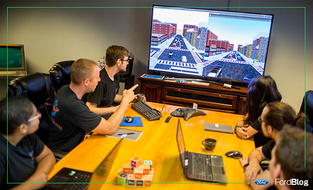 Equipo de Quantum Signal durante un reunión sobre tecnología autónoma